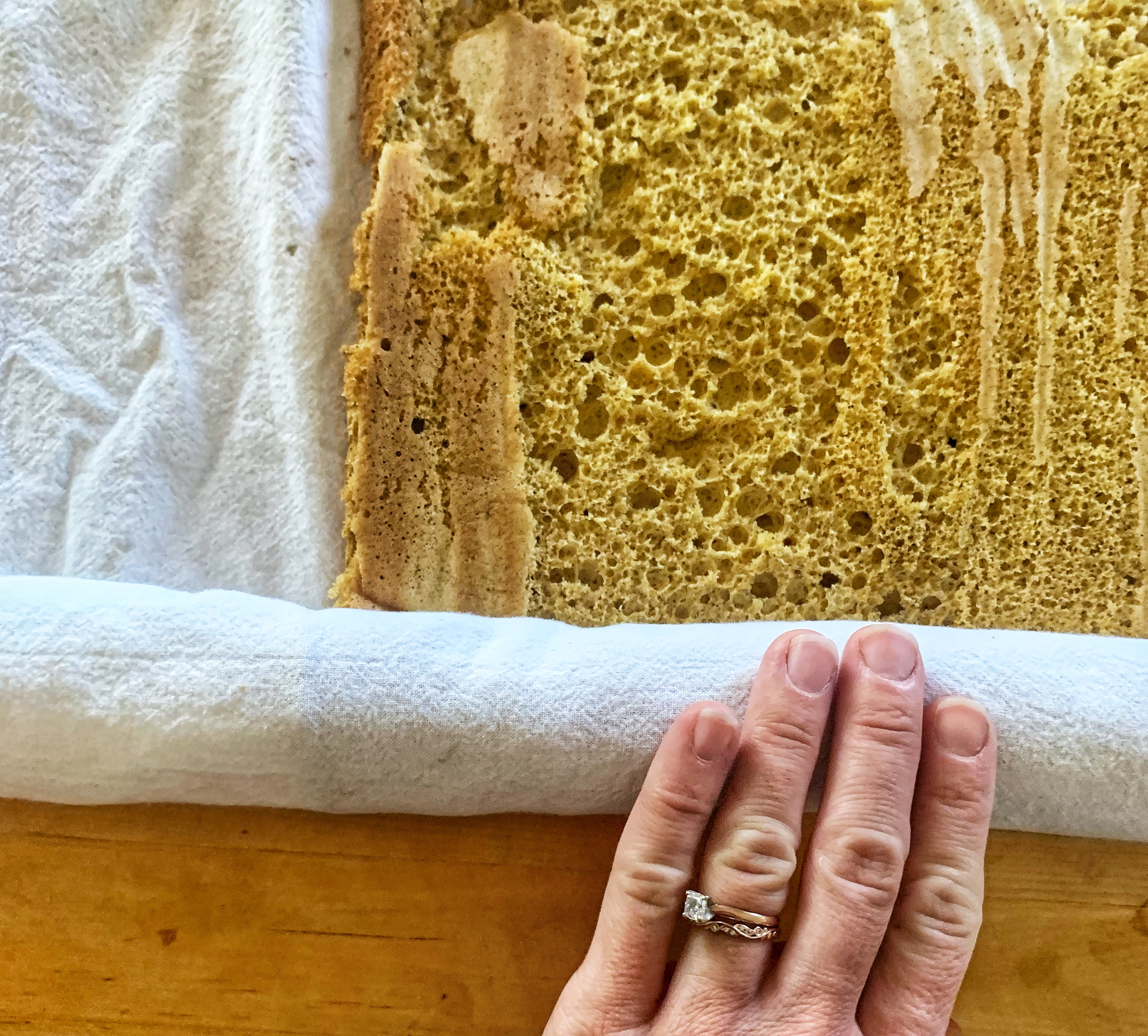 in progress shot of rolling cake