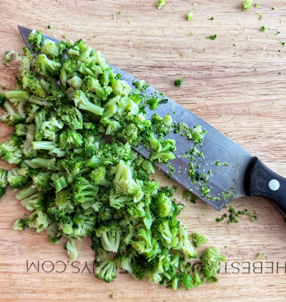 chopped broccoli on cutting board
