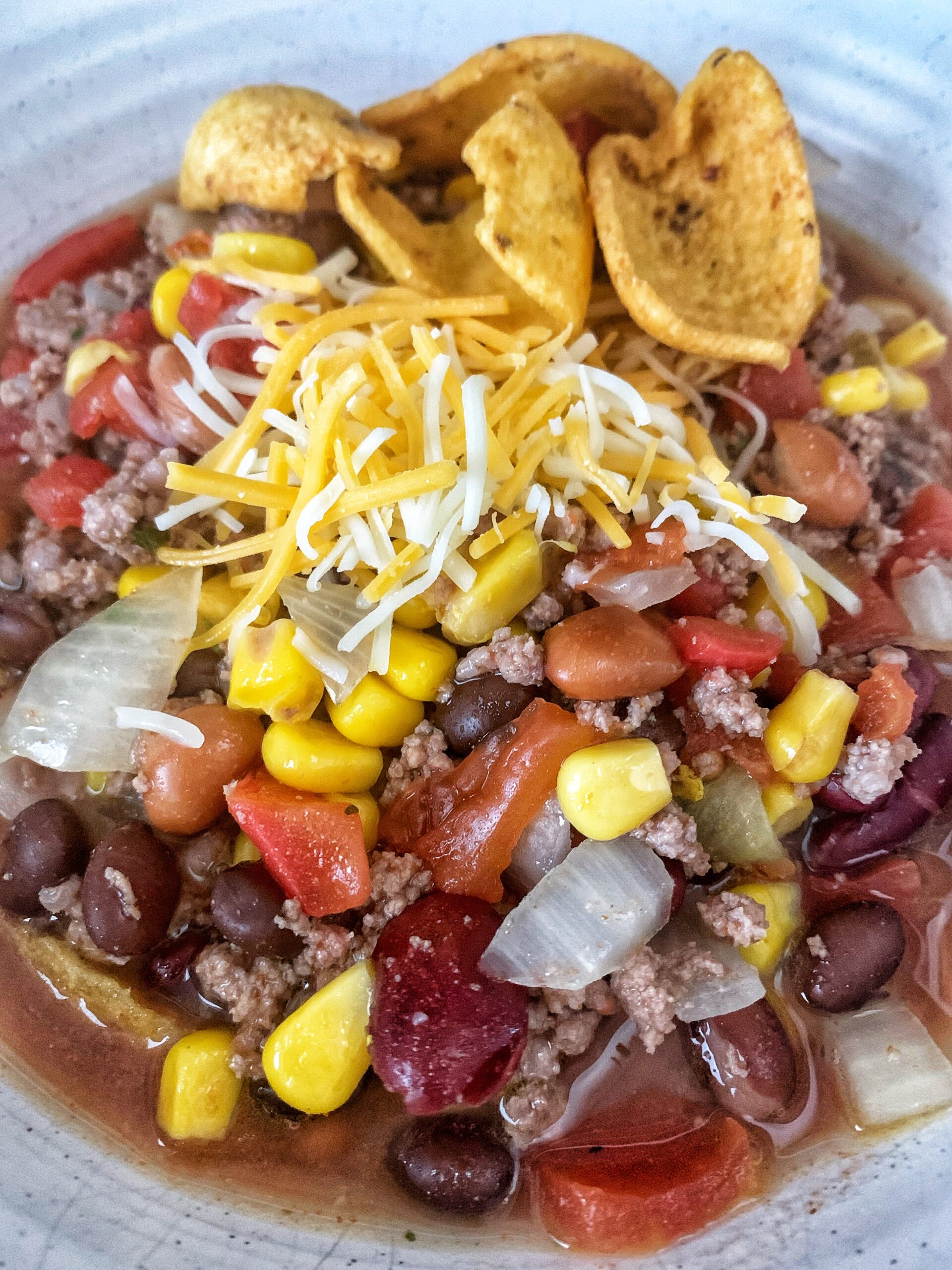 soup with cheese and Frito topping